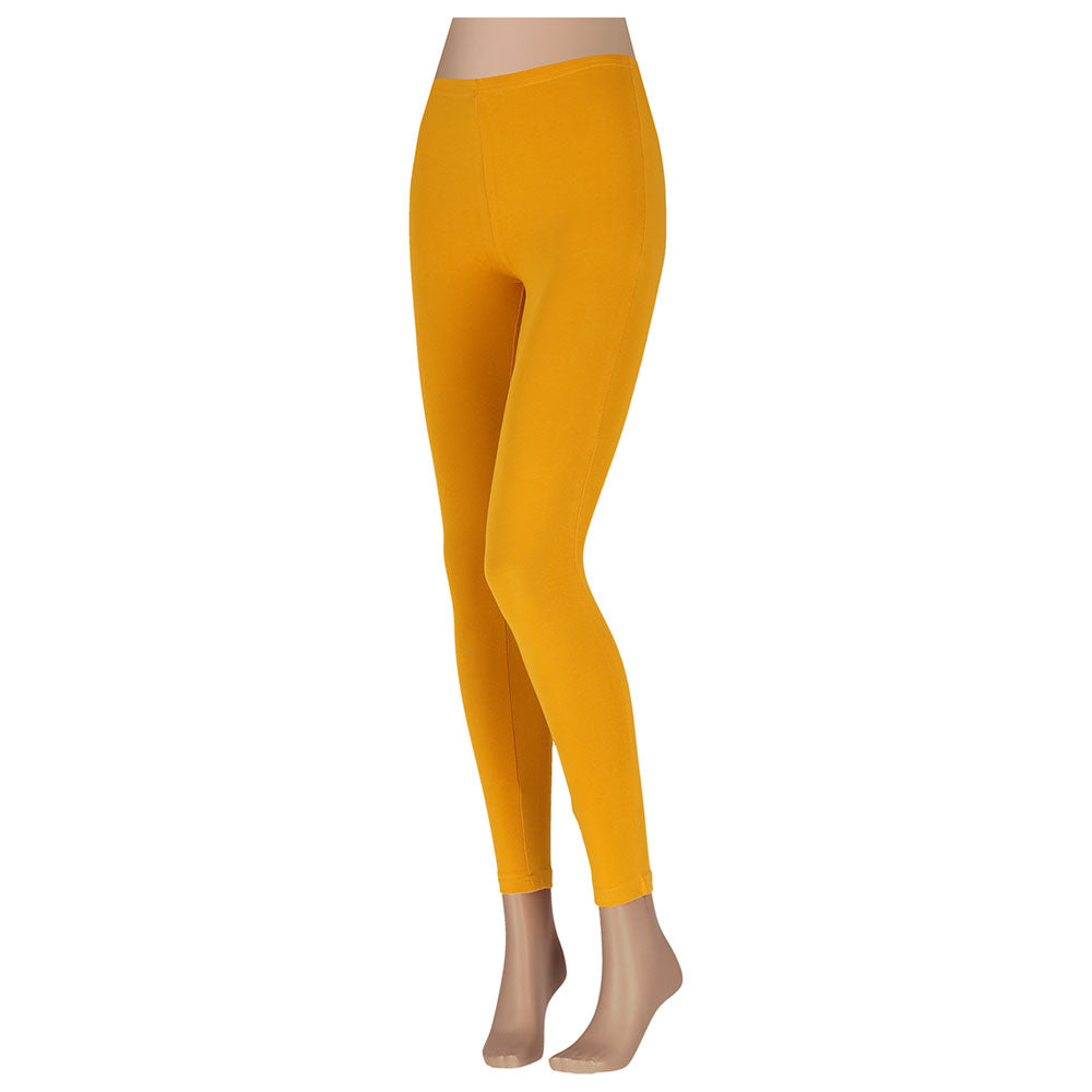 Mosterd gele katoenen dameslegging van Sarlini valt niet te strak rond de taille en benen